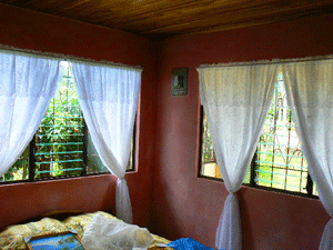 The bright bedrooms have large windows.